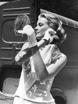 Grace Kelly mirror primping To Catch a Thief photo by Edward Quinn